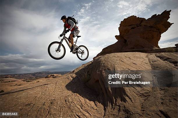 mountain biking on slickrock - one per stock pictures, royalty-free photos & images