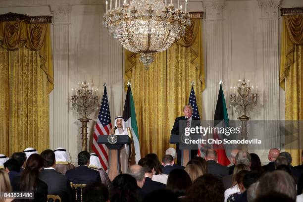 Amir Sabah Al-Ahmad Al-Jaber Al-Sabah of Kuwait and U.S. President Donald Trump take questions from reporters during a joint news conference in the...