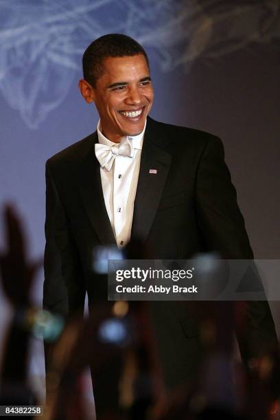 President Barack Obama arrives on stage duringduring MTV & ServiceNation: Live From The Youth Inaugural Ball at the Hilton Washington on January 20,...