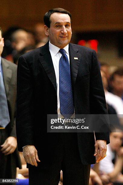 Head coach Mike Krzyzewski of the Duke Blue Devils smiles in response to a call during the game against the North Carolina State Wolfpack on January...