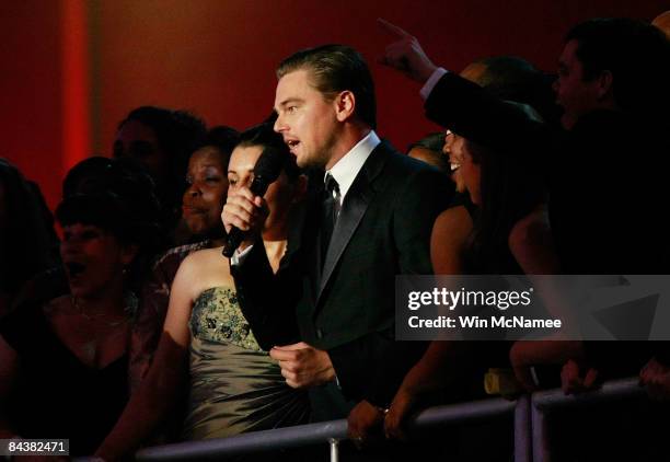 Leonardo DiCaprio talks with the the crowd during the Neighborhood Inaugural Ball on January 20, 2009 in Washington, DC. President Barack Obama is...