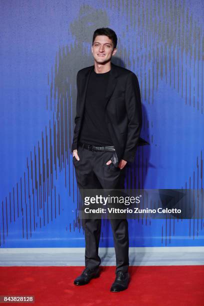 Andrea Lattanzi walks the red carpet ahead of the 'Manuel' screening during the 74th Venice Film Festival at Sala Giardino on September 7, 2017 in...
