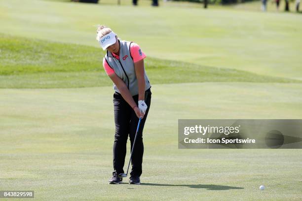 Golfer Brooke Henderson chips with a fairway wood on the 9th hole during the first round of the Indy Women In Tech on September 7, 2017 at the...