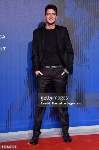 Andrea Lattanzi walks the red carpet ahead of the 'Manuel' screening during the 74th Venice Film Festival at Sala Giardino on September 7, 2017 in...