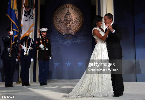 President Barack Obama and his wife First Lady Michelle Obama dance on stage during MTV & ServiceNation: Live From The Youth Inaugural Ball at the...