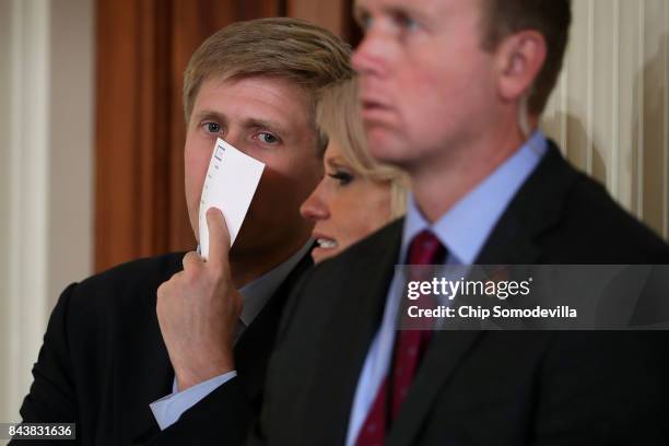 Vice Presidential Chief of Staff Nick Ayers talks with White House Counselor to the President Kellyanne Conway before a joint news conference with...