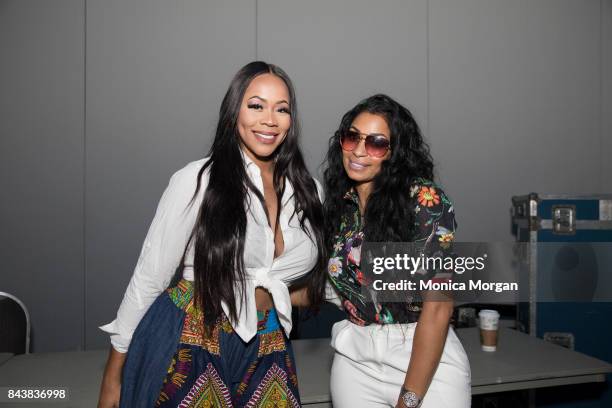 Personalities Deelishis and Karlie Redd backstage during the 2017 Women's Empowerment Expo at Cobo Center on August 26, 2017 in Detroit, Michigan.