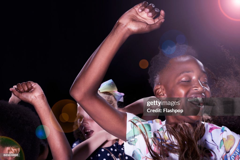 Group of children having fun at a party