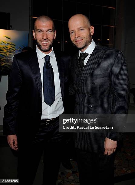 Zinedine Zidane and Marc Forster attend the IWC Schaffhausen Private Dinner Reception held at the Batiment des Forces Motrices during the Salon...