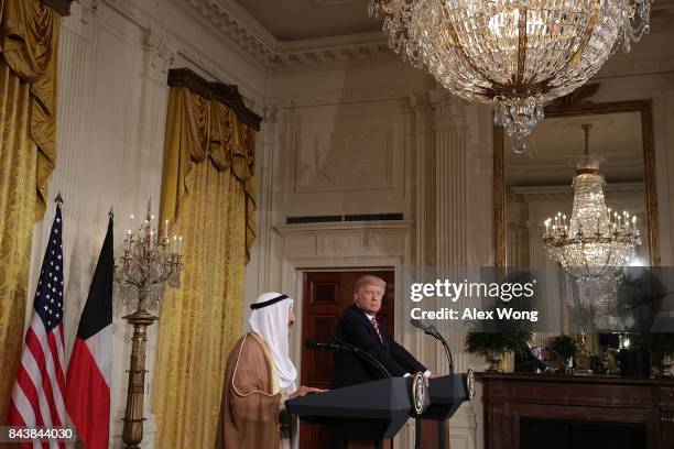 Amir Sabah Al-Ahmad Al-Jaber Al-Sabah of Kuwait and U.S. President Donald Trump participate in a joint news conference in the East Room of the White...