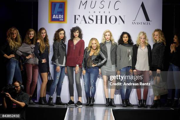 Singer Anastacia poses with models during the ALDI SUED x Anastacia collection launch 'Music loves Fashion' at E-Werk on September 7, 2017 in...