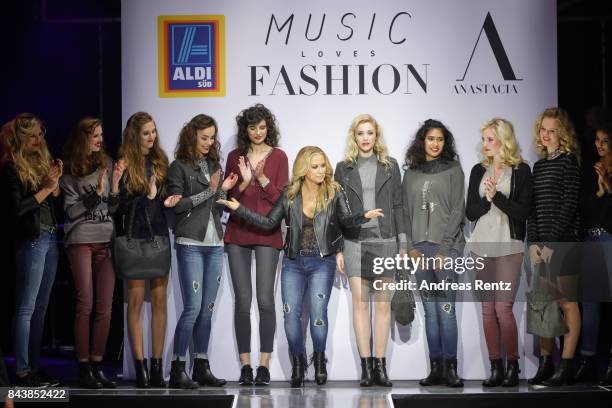 Singer Anastacia poses with models during the ALDI SUED x Anastacia collection launch 'Music loves Fashion' at E-Werk on September 7, 2017 in...