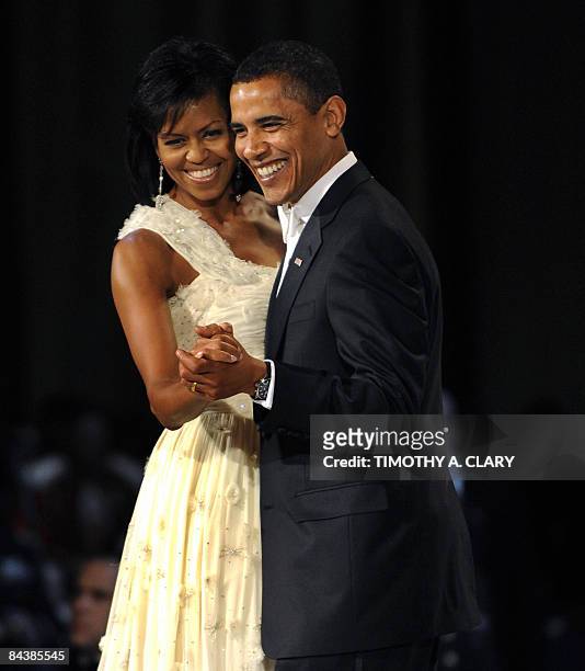 President Barack Obama and his wife Michelle dance during the Commander in Chief's Ball at the National Building Museum in Washington January 20 2009...