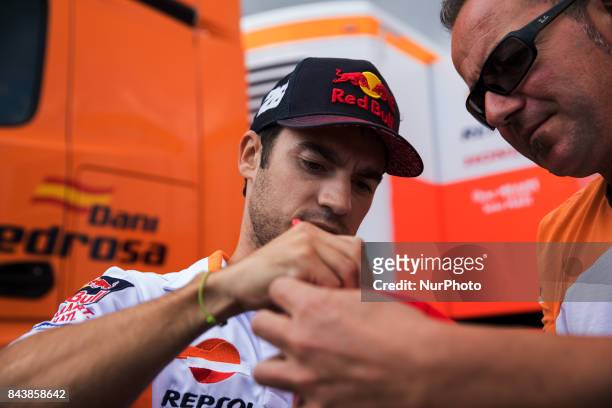 Dani Pedrosa of Repsol Honda Team sign autographs before the presentation press conference of the Tribul Mastercard Grand Prix of San Marino and...