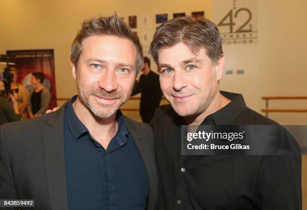 Associate Diretor Gavin Mitford and Lyricist Glenn Slater pose at a photo call for the National Tour of Andrew Lloyd Webber's "Love Never Dies" at...