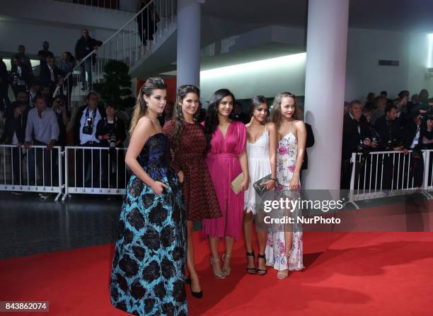 Venice, Italy. 07 September, 2017: Ophelie Bau, Mel Einda El Asfour, Hafsia Herzi, Lou Luttiau and Alexia Chardard walks the red carpet ahead of the...