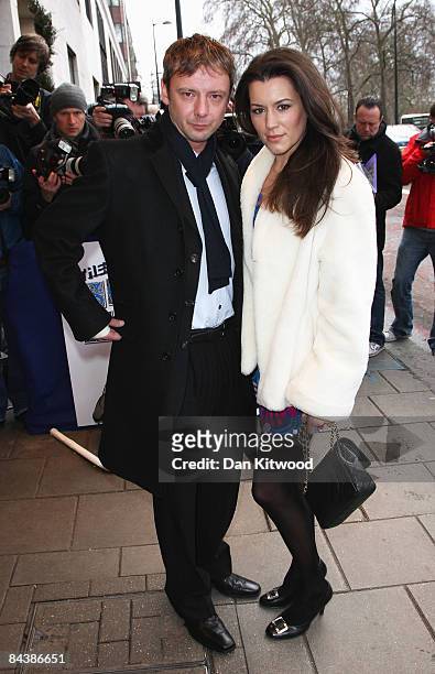 Actor John Simm and wife Kate Magowan arrive for the South Bank Show Awards at the Dorchester Hotel on January 20, 2009 in London, England.