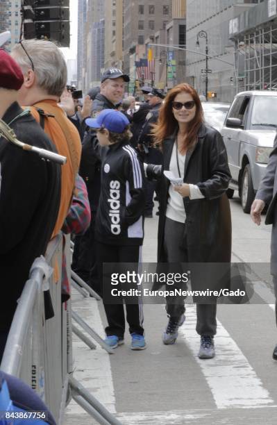 Actress Debra Messing during a March On Tax Day to demand that United States President Donald Trump release his tax returns, at Bryant Park,...