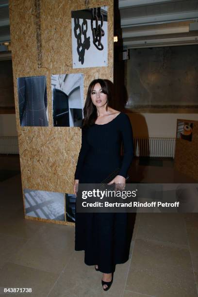 Actress Monica Bellucci, dressed in Azzedine Alaia, attends the "Richard Wentworth a la Maison Alaia" Exhibition Opening at Azzedine Alaia Gallery on...