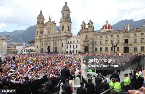 Pope Francis stands on the popemobil as he greets the faithful at Bolivar square during the apostolic 5-day visit on September 07, 2017 in Bogota,...