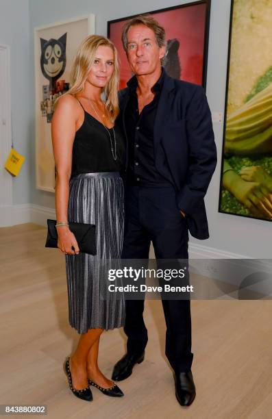 Malin and Tim Jefferies attend a dinner at Sotheby's to celebrate the opening of "Shake It Up: Works from the Mario Testino Collection", an auction...