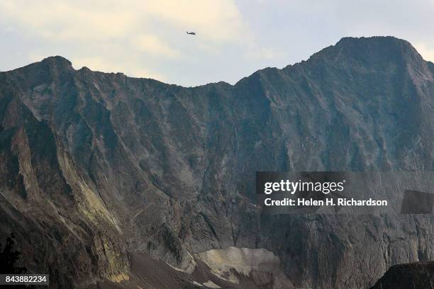 National Guard Black Hawk helicopter searches for a stranded climber near the K2 summit on Capitol Peak on September 6, 2017 in the Maroon...