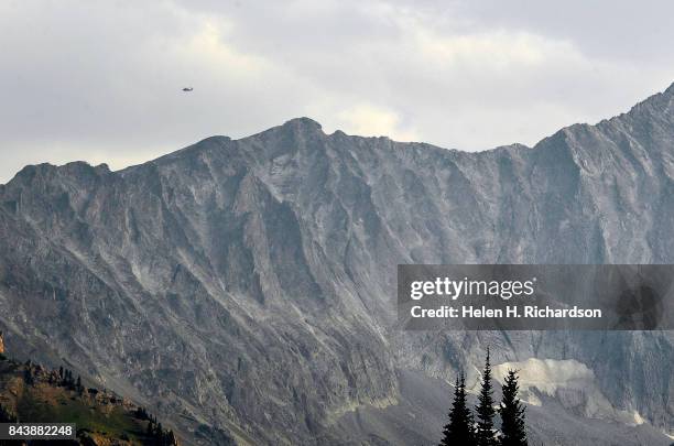 National Guard Black Hawk helicopter searches for a stranded climber near the K2 summit on Capitol Peak on September 6, 2017 in the Maroon...