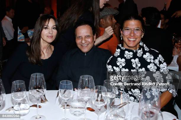 Actress Monica Bellucci, stylist Azzedine Alaia and Camille Miceli attend the "Richard Wentworth a la Maison Alaia" Exhibition Opening at Azzedine...