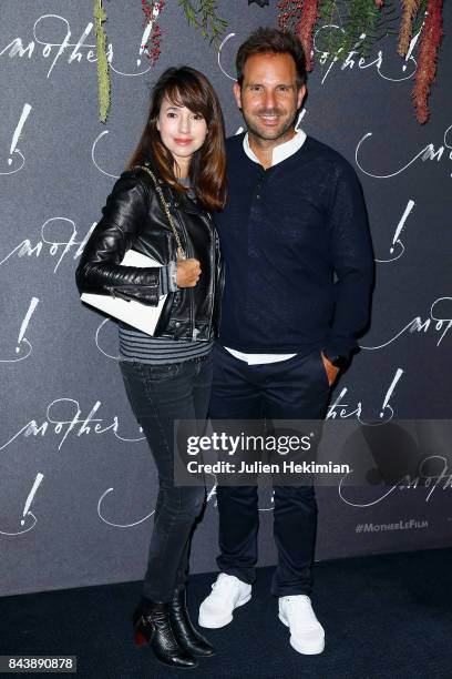 Christophe Michalak and Delphine McCarty attend the French Premiere of "mother!" at Cinema UGC Normandie on September 7, 2017 in Paris, France.