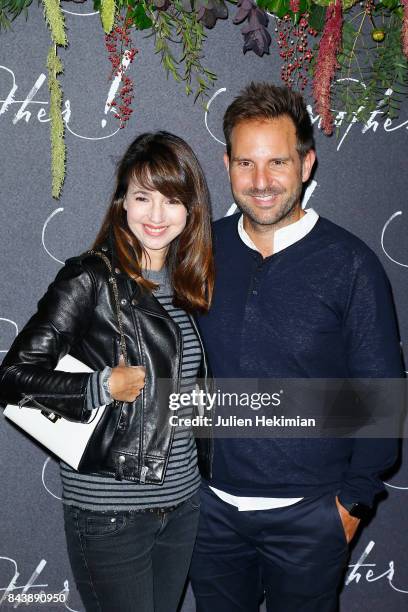 Christophe Michalak and Delphine McCarty attend the French Premiere of "mother!" at Cinema UGC Normandie on September 7, 2017 in Paris, France.