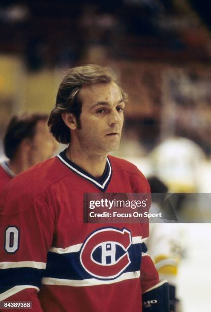 Guy Lafleur of the Montreal Canadiens on the ice during a break in the action at an NHL Hockey game mid circa 1970's. Lafleur played for the...