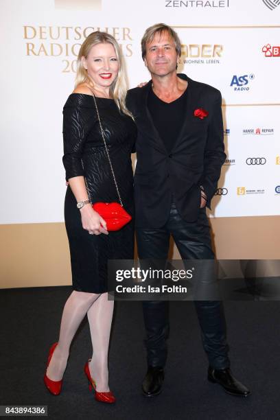 Steve Norman and his girlfriend Sabrina Winter attend the 'Deutscher Radiopreis' at Elbphilharmonie on September 7, 2017 in Hamburg, Germany.