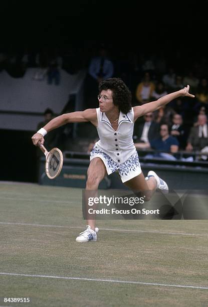 Billie Jean King of the USA hits a backhand return against Evonne Cawley during championship play of the women's singles at the Wimbledon Lawn Tennis...