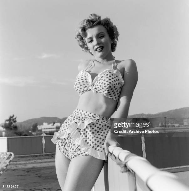 American actress Marilyn Monroe wearing a polka dot bikini, circa 1951.