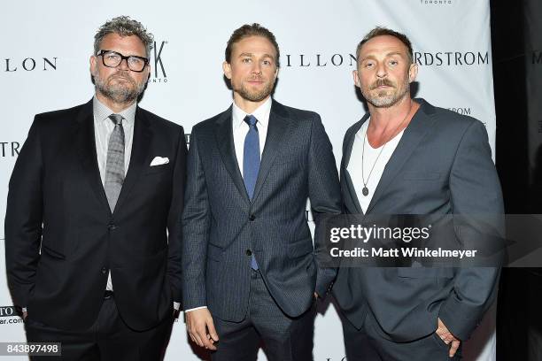 Actors Yorick Van Wageningen, Charlie Hunnam, and Roland Moller attend the Nordstrom Supper Suite "Papillon" Official Pre-Premiere cocktail party at...