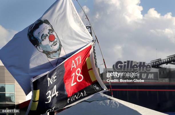 Flag mocking NFL Commissioner Roger Goodell flies over the tent of Patriots fan Chris O'Neil of Boston. The New England Patriots host the Kansas City...