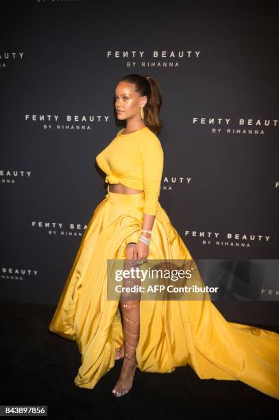 Rihanna arrives to celebrate the launch of her beauty brand, Fenty Beauty by Rihanna, on September 7, 2017 in New York. / AFP PHOTO / Bryan R. Smith
