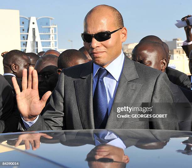 Photo taken on October 30, 2008 shows the son of Senegalese President Abdoulaye Wade, Karim Wade, after taking part in a ceremony marking the...