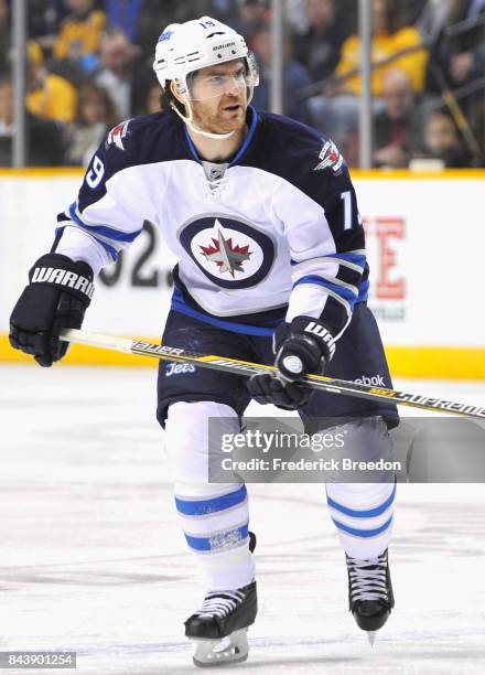Jim Slater of the Winnipeg Jets plays in the game against the Nashville Predators at Bridgestone Arena on March 7, 2015 in Nashville, Tennessee.
