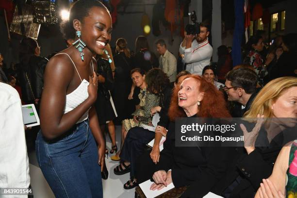 Actor Lupita Nyong'o and Creative Director at Large of Vogue Magazine Grace Coddington attend the Calvin Klein Collection fashion show during New...