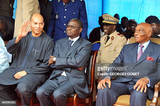 Photo taken on November 18, 2008 shows Senegalese President Abdoulaye Wade , his son Karim and the speaker of the Senegalese assembly, Mamadou Seck,...