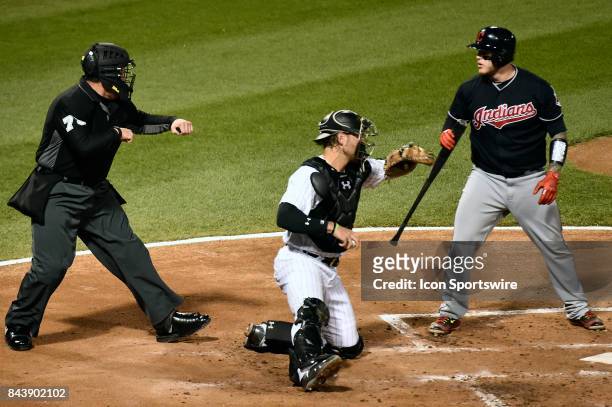 Cleveland Indians' Roberto Perez reacts and looks back at the home umpire Manny Gonzalez after being called out on strikes during the game between...