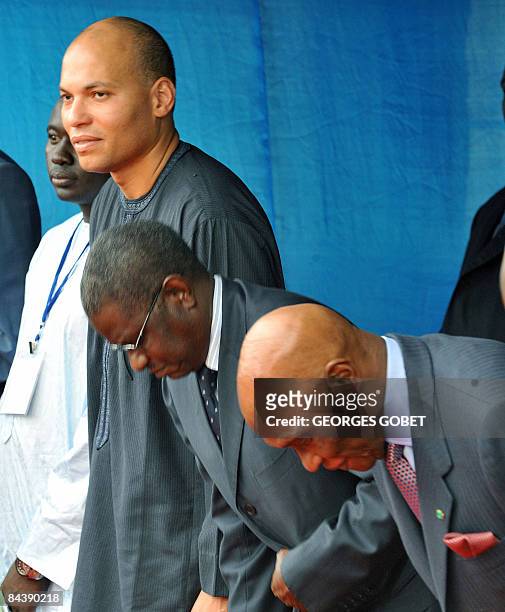 Photo taken on November 18, 2008 shows Senegalese President Abdoulaye Wade , his son Karim and the speaker of the Senegalese assembly, Mamadou Seck ,...