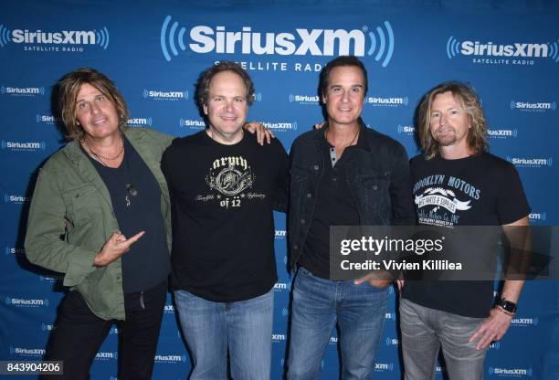 Dean DeLeo, Eddie Trunk, Robert DeLeo and Eric Kretz attend SiriusXM's Town Hall with Stone Temple Pilots at The Gibson Showroom in Los Angeles on...