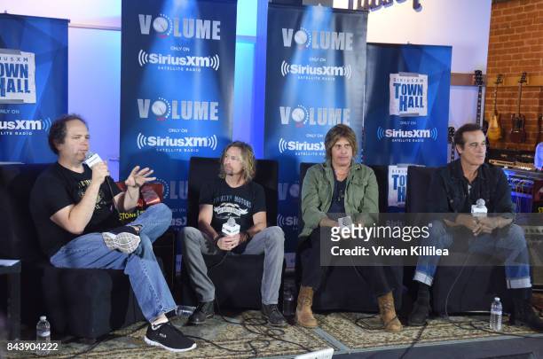 Eddie Trunk, Eric Kretz, Dean DeLeo and Robert DeLeo speak at SiriusXM's Town Hall with Stone Temple Pilots at The Gibson Showroom in Los Angeles on...