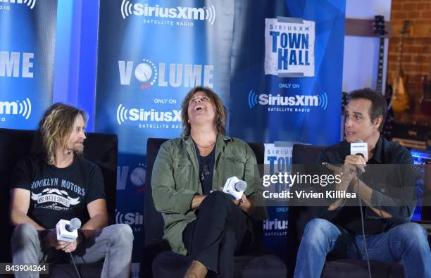 Eric Kretz, Dean DeLeo and Robert DeLeo speak at SiriusXM's Town Hall with Stone Temple Pilots at The Gibson Showroom in Los Angeles on September 7,...