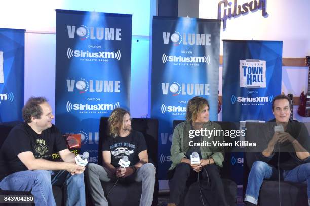 Eddie Trunk, Eric Kretz, Dean DeLeo and Robert DeLeo speak at SiriusXM's Town Hall with Stone Temple Pilots at The Gibson Showroom in Los Angeles on...