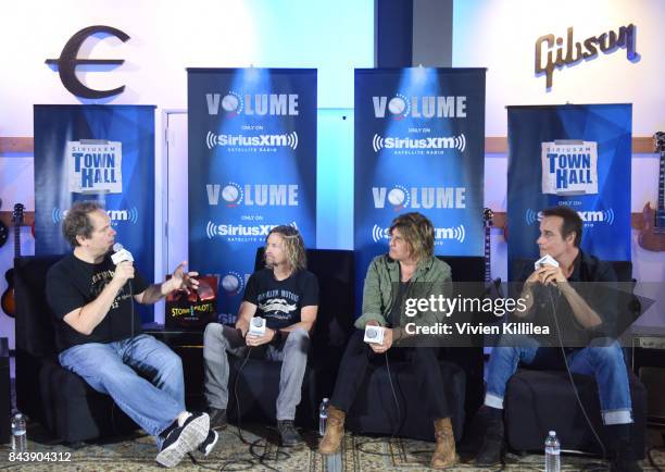 Eddie Trunk, Eric Kretz, Dean DeLeo and Robert DeLeo speak at SiriusXM's Town Hall with Stone Temple Pilots at The Gibson Showroom in Los Angeles on...