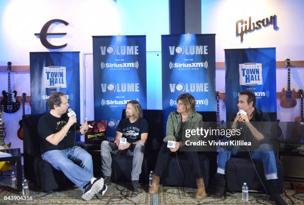 Eddie Trunk, Eric Kretz, Dean DeLeo and Robert DeLeo speak at SiriusXM's Town Hall with Stone Temple Pilots at The Gibson Showroom in Los Angeles on...