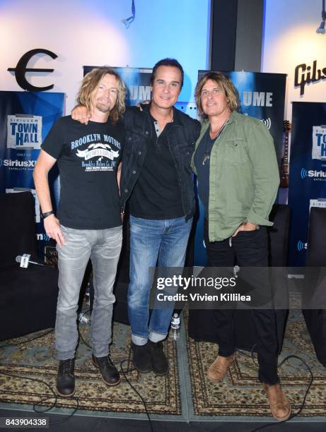 Eric Kretz, Robert DeLeo and Dean DeLeo attend SiriusXM's Town Hall with Stone Temple Pilots at The Gibson Showroom in Los Angeles on September 7,...